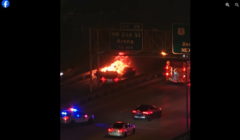 A car was engulfed in flames on I-95 in downtown Miami on Monday, June 10, 2024.