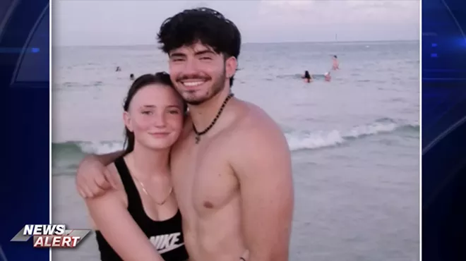 victor castaneda and his sister pose on a the beach