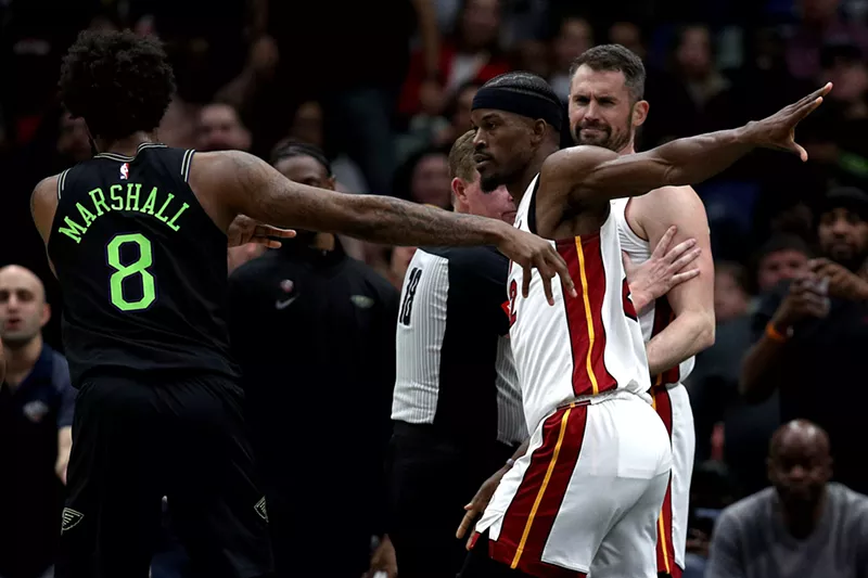 Image: Naji Marshall of the New Orleans Pelicans and Jimmy Butler of the Miami Heat got into an altercation that interrupted the fourth quarter of an NBA game at Smoothie King Center in New Orleans on February 23, 2024.