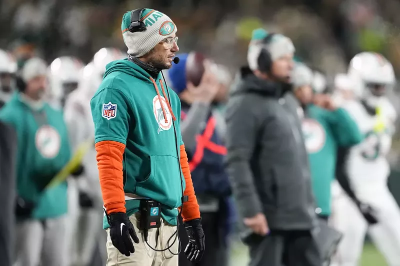 Image: Head coach Mike McDaniel of the Miami Dolphins looks on against the Green Bay Packers during the first half of the game at Lambeau Field on November 28, 2024, in Green Bay, Wisconsin.
