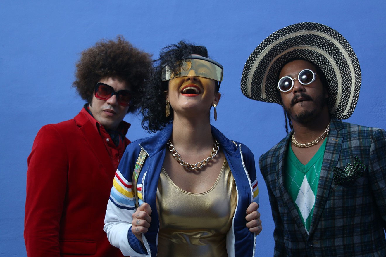 Sol + the Tribu's Rey “Sugar” (left), Sol “La Barbara” Ruiz, and Manny “Mr. Swag” are back from the future to reinvent Miami music.