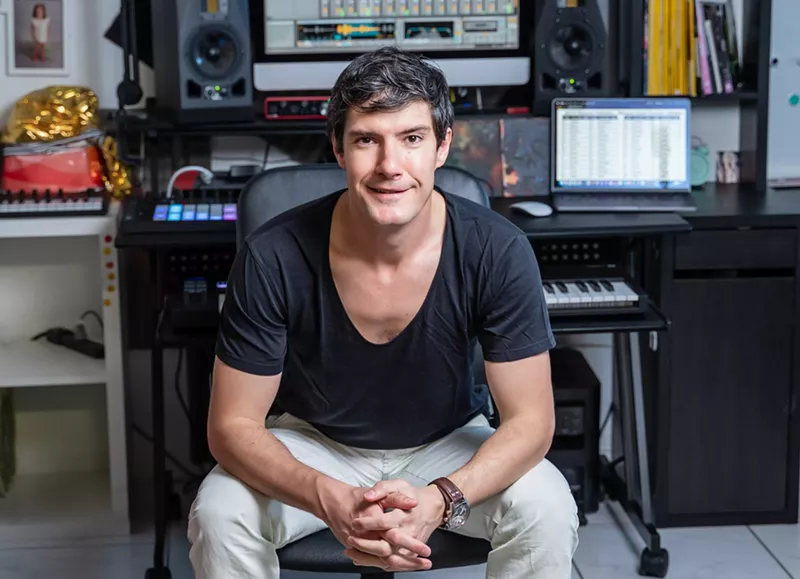 Image: Predrag Pedja Kovačević sitting in a chair in his music studio