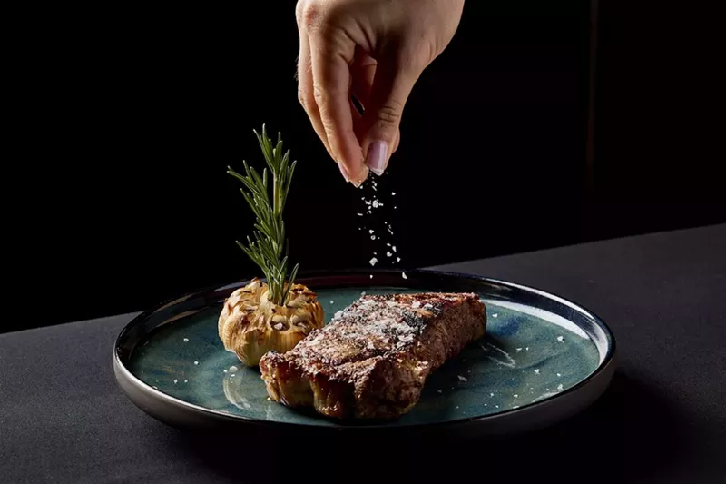 Image: South Beach landmark Mango’s Tropical Café enters a new era in 2025 with chef Byron Rubio, introducing steakhouse-style dishes like USDA Prime ribeye