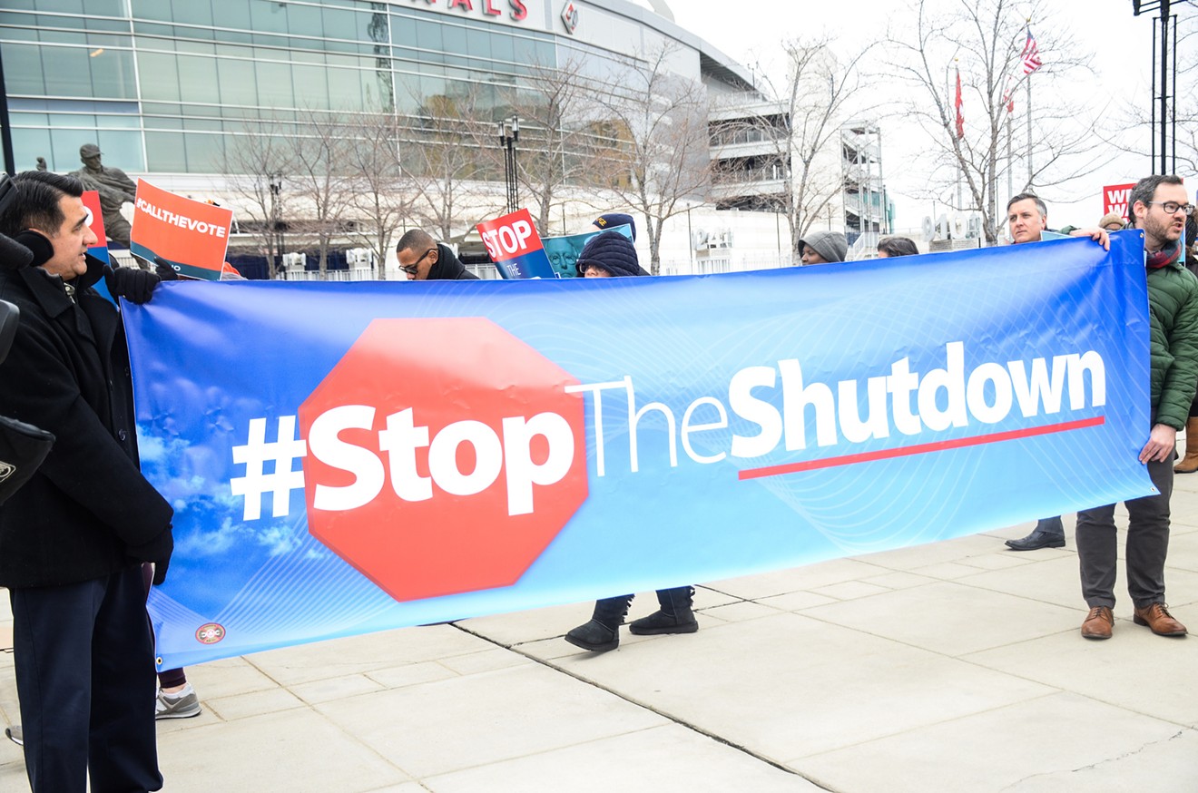 Federal workers protest the government shutdown at Nationals Park.