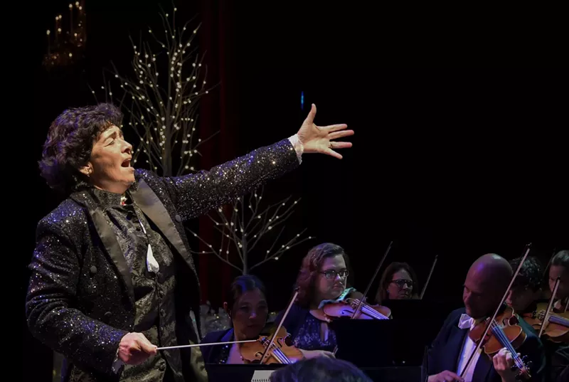 Image: Sebrina María Alfonso conducts an orchestra onstage