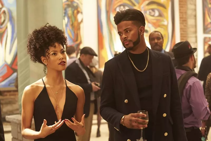 Image: Trevor Jackson (right) plays a suave drug dealer named Priest and Lex Scott Davis is Georgia in SuperFly, Director X’s blinged-out redo of the 1972 blaxploitation classic.