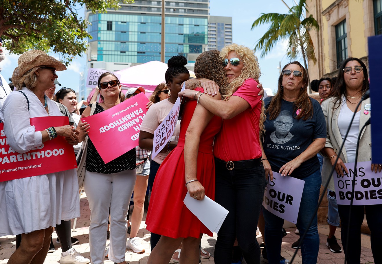 Rachel Friedland (right) hugs U.S. Rep. Debbie Wasserman Schultz on May 3, 2022, at a rally supporting guaranteed federal abortion rights.