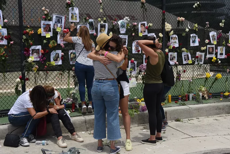 Image: A memorial for those missing at Champlain Towers South.
