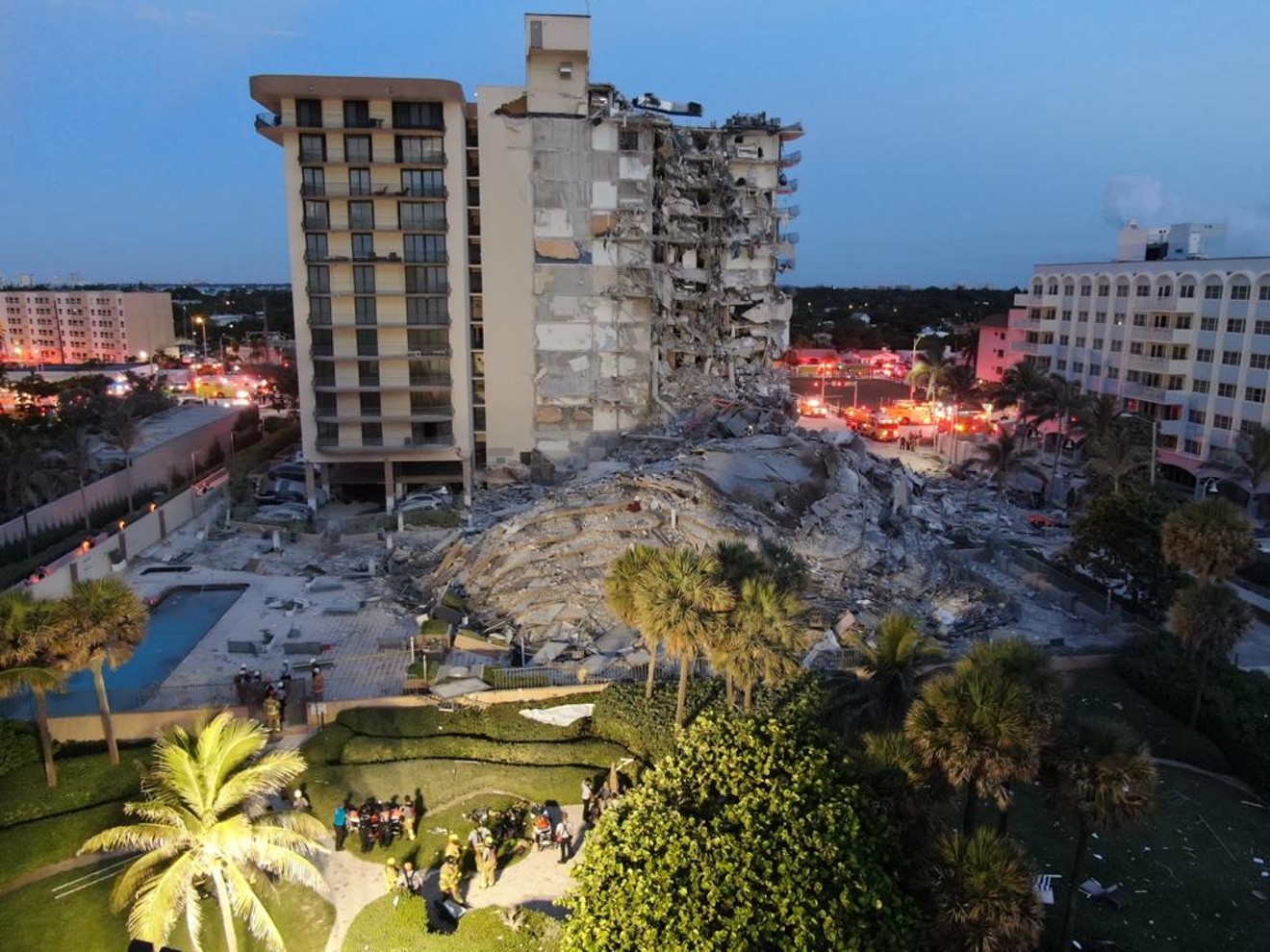 An early-morning view of the devastation from the Champlain Towers condo collapse in Surfside.