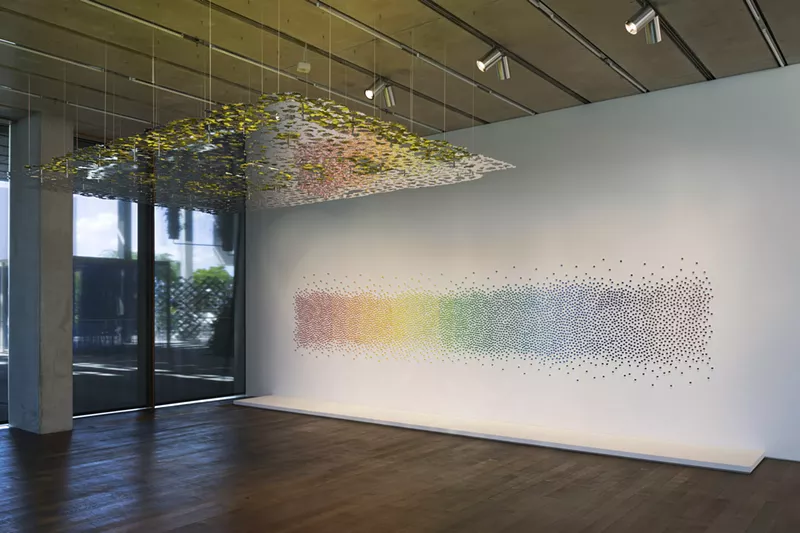Image: Teresíta Fernandez’s “Untitled (Green),” featuring mirror aluminum composite and paint.