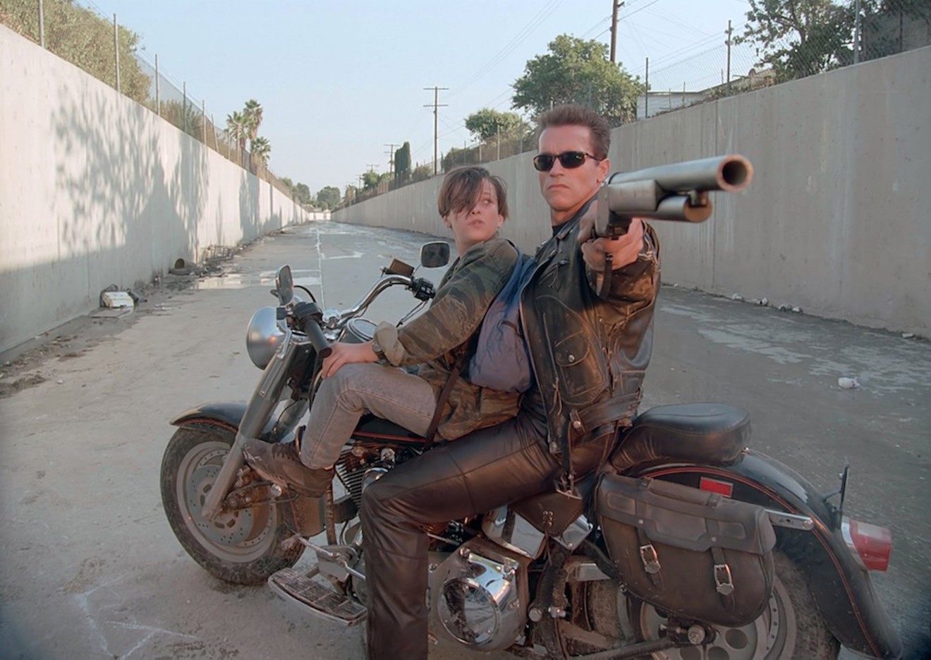In Terminator 2: Judgment Day, Arnold Schwarzenegger (right) returns as a robot sent to protect Sarah Connor and her teenage son, played by Edward Furlong.