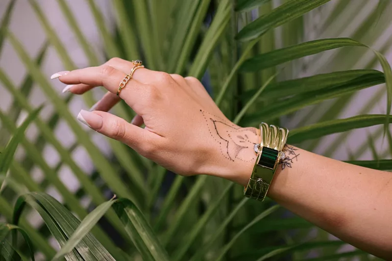 Image: A hand models an ornate bracelet