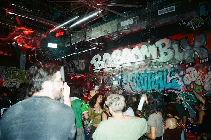 Image: People dancing at a warehouse