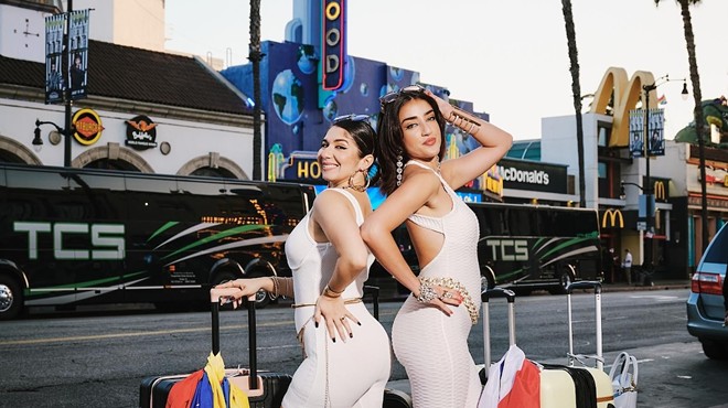 The Chonga Girls posing on a sidewalk in Hollywood, California.