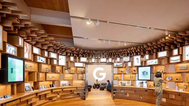 view inside a Google store with wood interiors and shelves