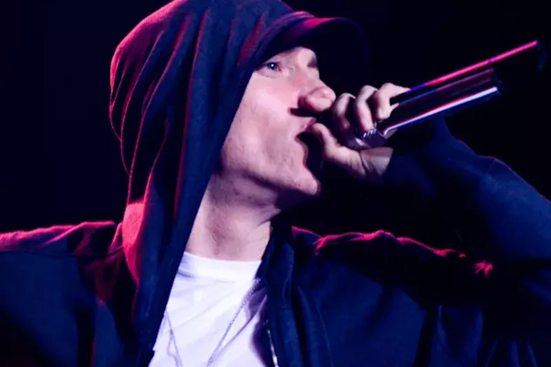 Image: Portrait of Eminem holding a microphone