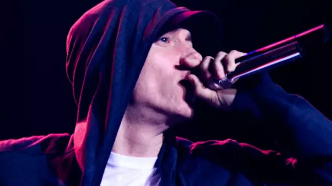 Portrait of Eminem holding a microphone