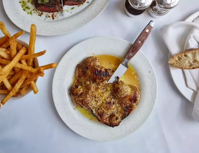 Image: Roasted chicken at La Petite Maison.