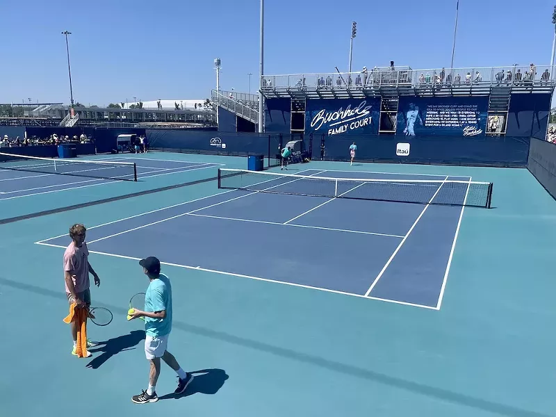 Image: World No. 4 player Alex Zverev warms up on the practice court on Saturday, March 26, 2022.