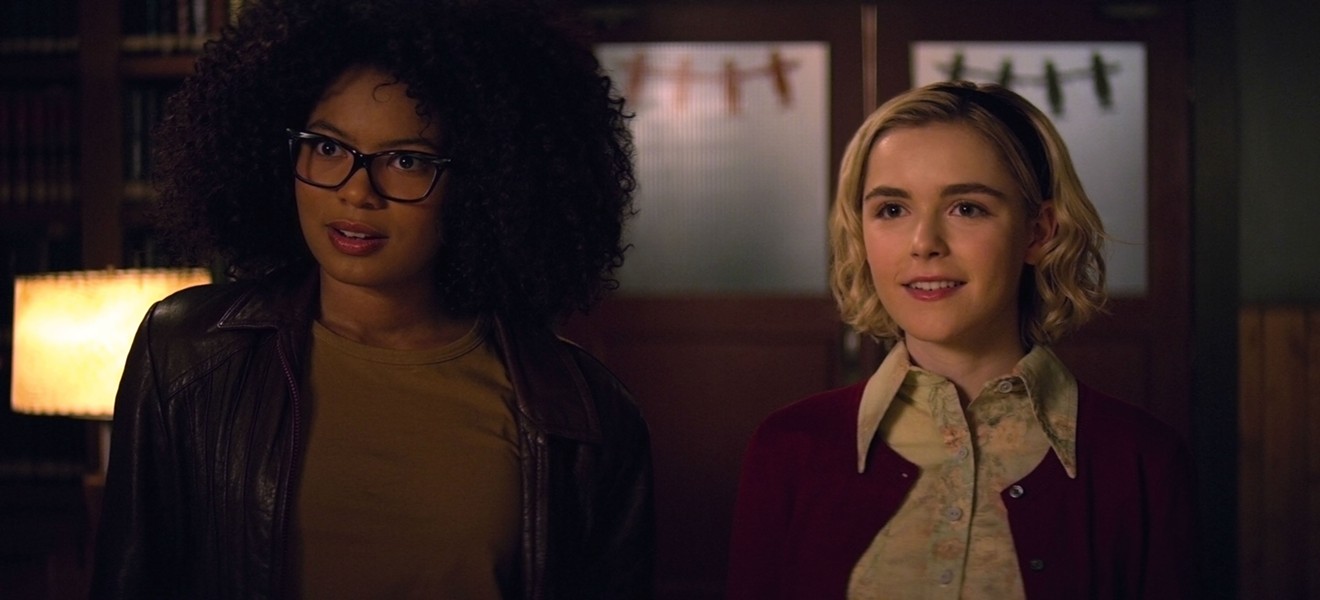 Kiernan Shipka (right) stars as America’s favorite teenage witch, who talks casually of patriarchy and intersectionality with her best friend Roz (Jaz Sinclair), in Netflix’s Chilling Adventures of Sabrina.