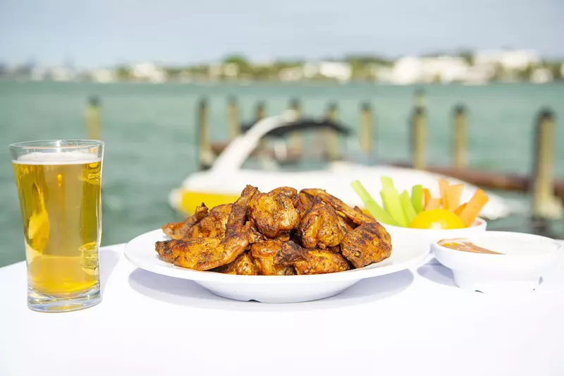 Image: Grilled wings from Shuckers come with a water view.