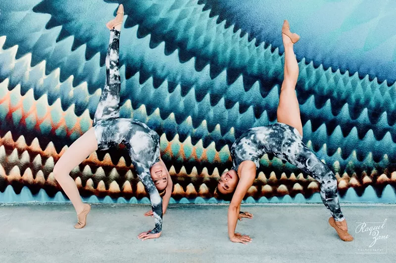 Image: Rainbow Circus performers in front of mural by HOXXOH at Haber Law’s Wynwood office
