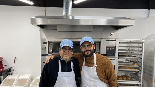 Portrait of Manuel and Jesus Brazon in their kitchen