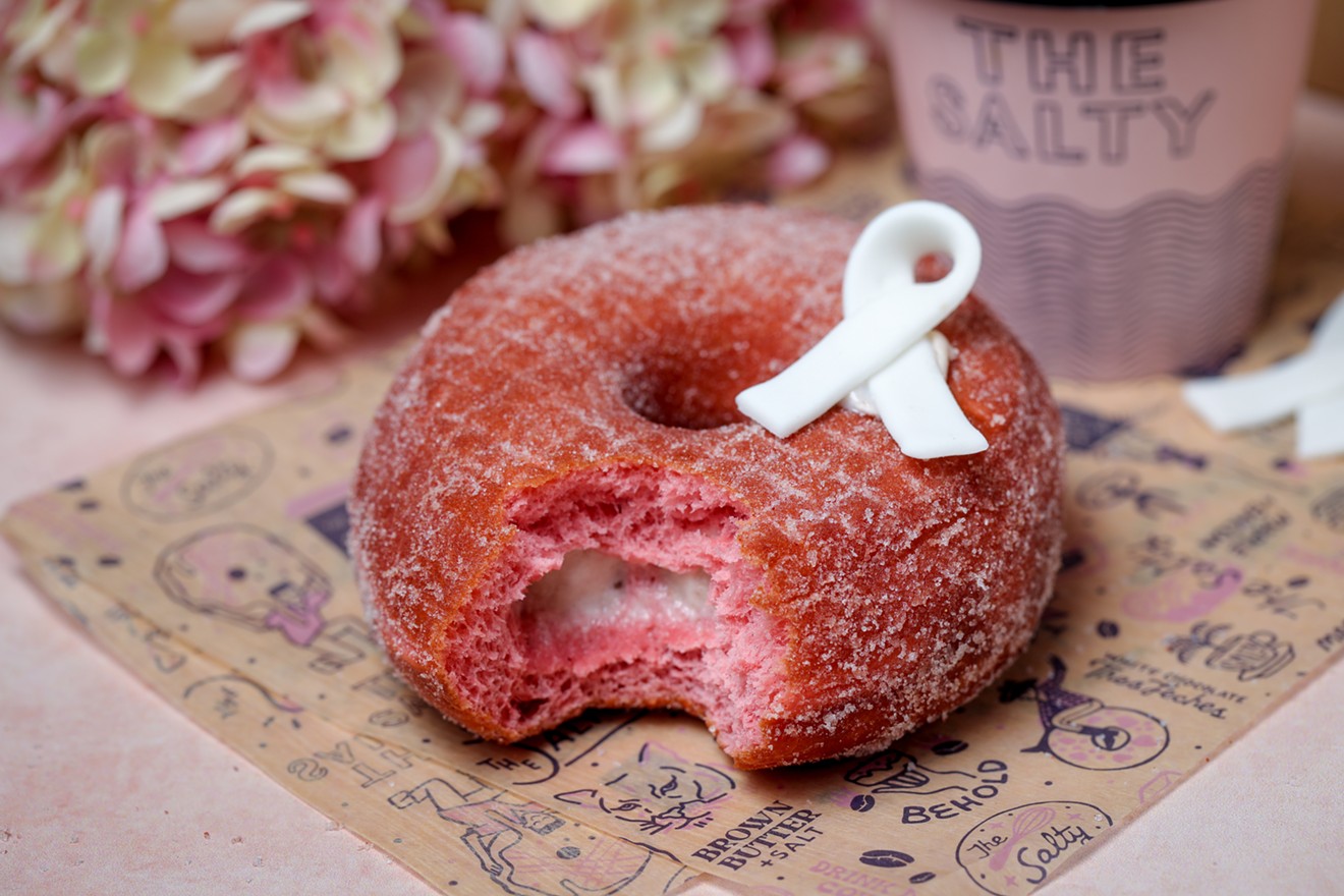 A bite from the whipped strawberry doughnut from the Salty for breast cancer awareness
