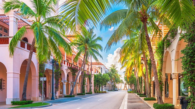 Palm-tree-lined ultra-posh commercial district in Palm Beach