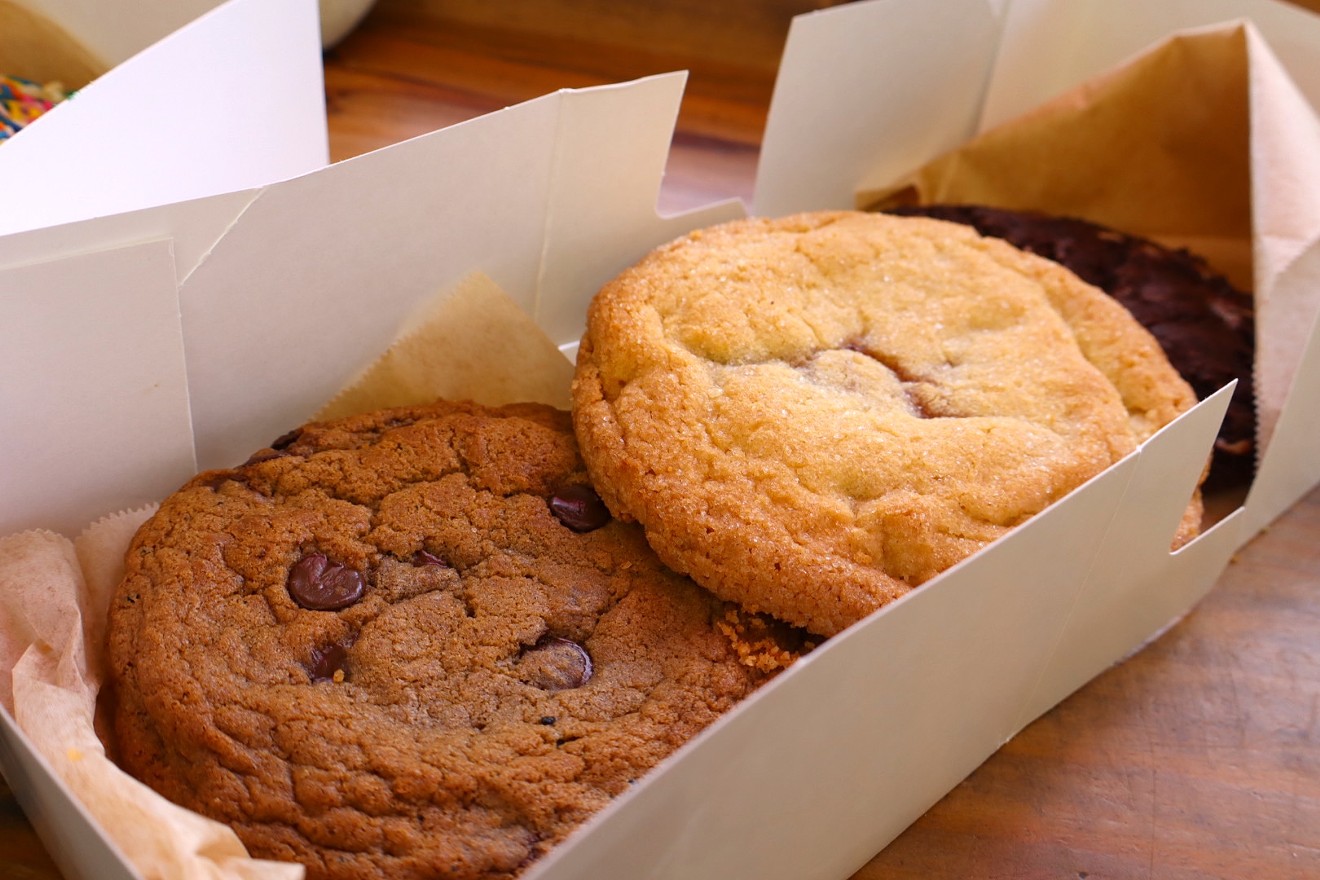 A box of cookies from Cindy Lou's Cookies in Little River including a signature chocolate chip cookie and "Quesito."