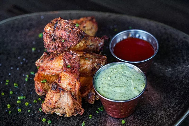 Image: Thorn is becoming known for its chicken wings that can be prepared with a house dry rub or homemade sauces like blue cheese, honey truffle sriracha, and the green-hued "almost" ranch.