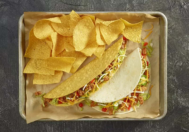 Image: Tacos and tortilla chips on platter