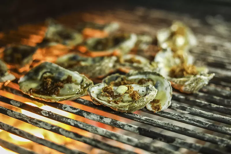 Image: Pez's grilled oysters topped with machaca.
