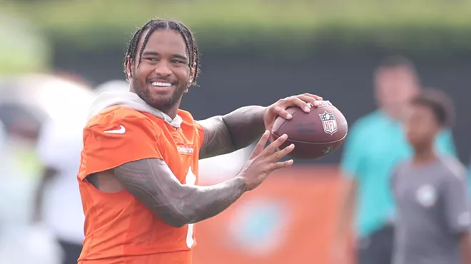 Tua Tagovailoa #1 of the Miami Dolphins practices at Baptist Health Training Complex on July 28, 2025 in Miami Gardens, Florida
