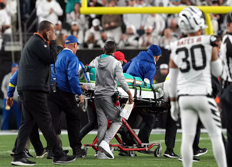 Image: Miami Dolphins medical personnel remove quarterback Tua Tagovailoa from the field during the second quarter of the September 29 game against the Bengals in Cincinnati.