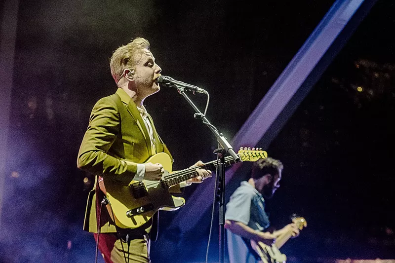 Image: Alex Trimble of Two Door Cinema Club performing onstage at FPL Solar Amphitheater