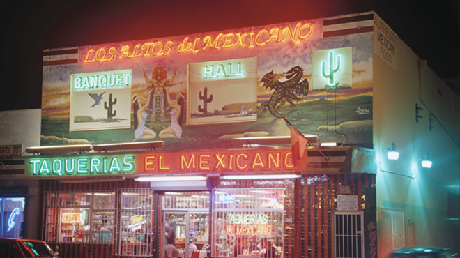 A vintage neon sign on a restaurant