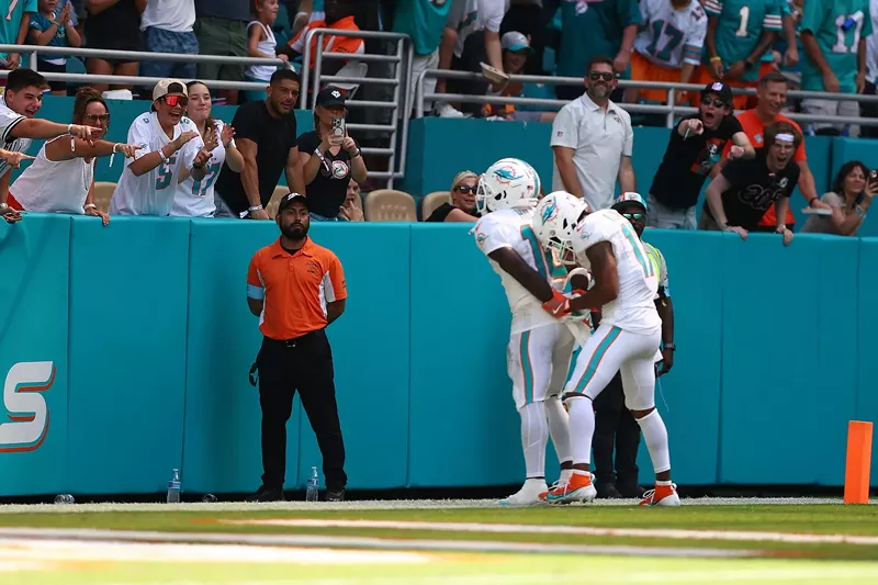 Image: Tyreek Hill #10 and Jaylen Waddle #17 of the Miami Dolphins celebrate after Hill's receiving touchdown during the third quarter against the Jacksonville Jaguars at Hard Rock Stadium on September 8, 2024, in Miami Gardens, Florida.