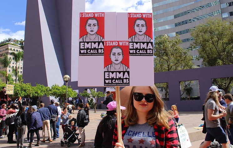 An activist in Los Angeles shows support for Parkland student activist Emma González. - PHOTO BY ROBB WILSON / FLICKR