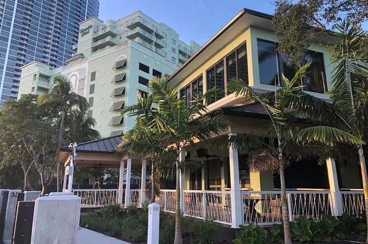 The patio at Boathouse at the Riverside overlooks 50 feet of dock space. - COURTESY OF RIVERSIDE HOTEL