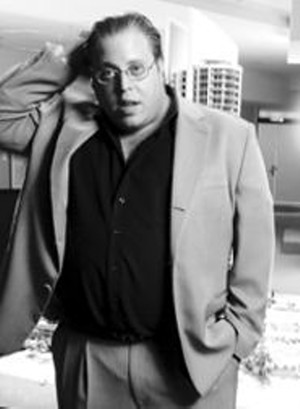 Gil Dezer posing for New Times in 2004. - JONATHAN POSTAL