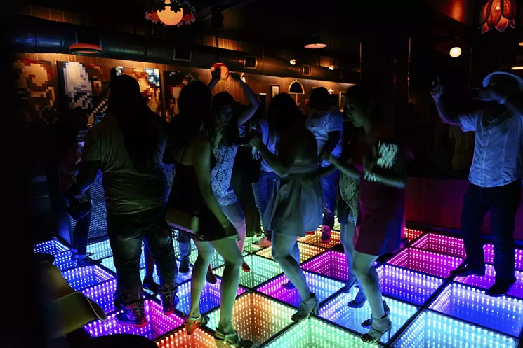 Purdy installed a rainbow light-up dance floor in 2016. - PHOTO BY KARLI EVANS / ALLSEEINGMEDIA.COM