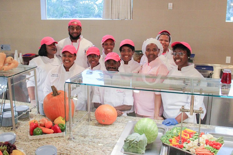 The ladies of Lotus House's culinary training program. - COURTESY OF LOTUS HOUSE