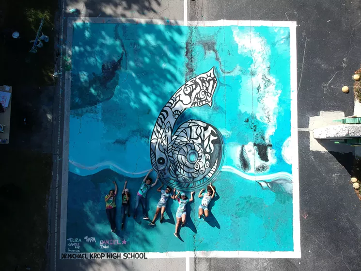 Underwater Marker painted directly onto street intersection by Xavier Cortada and high school arts & sciences students from Michael Krop Senior High School - XAVIER CORTADA
