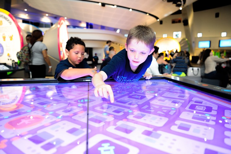 Kids explore the Phillip and Patricia Frost Museum of Science. - COURTESY OF FROST SCIENCE