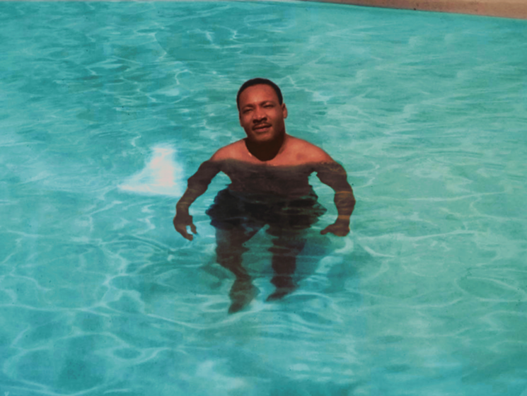 MLK in Miami at the Hampton House Hotel pool; c. 1965 - COURTESY OF MALCOLM LAUREDO/HAMPTON HOUSE / COLORIZED BY DAYANA IBARA