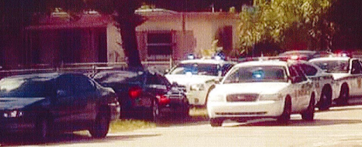 MDPD cruisers surrounded Menard's car (center) in 2017. - U.S. DISTRICT COURT FOR THE SOUTHERN DISTRICT OF FLORIDA