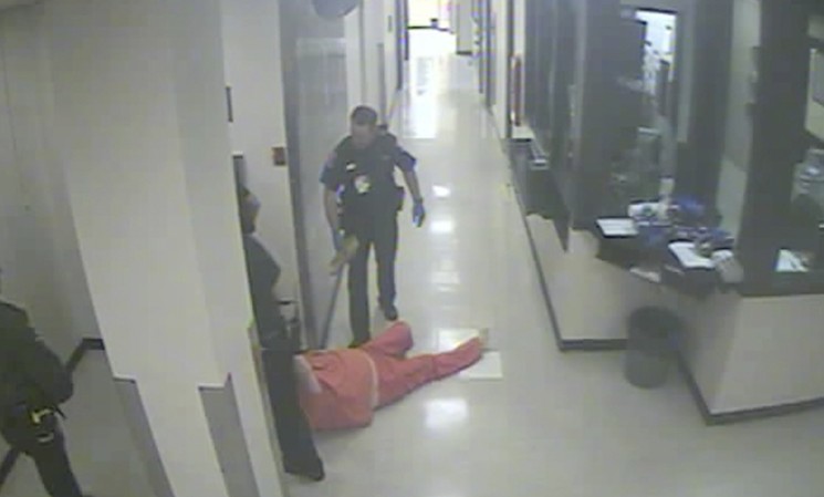 A still image of Karen Ibarra being dragged through the Sarasota County jail. - STILL VIA SARASOTA COUNTY SHERIFF'S OFFICE
