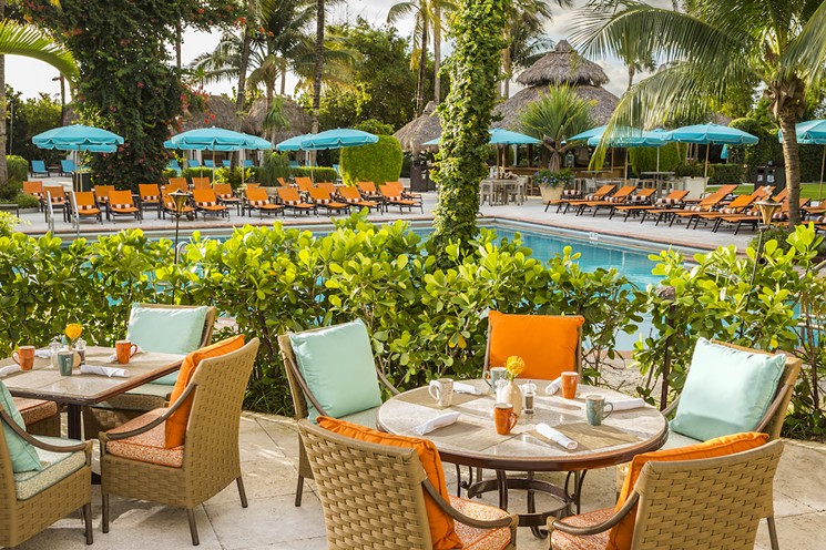 Outdoor dining at Essensia. - THE PALMS