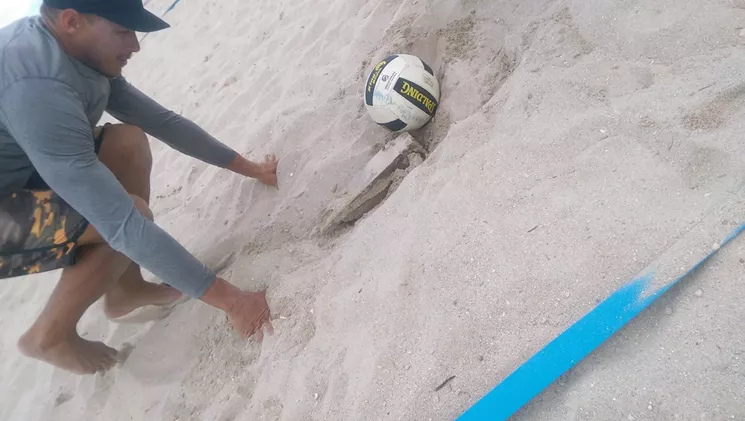 A volleyball player stumbled upon a cinder block from a past event. - PHOTO COURTESY OF BRANDON LOZANO